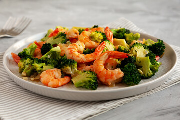 Homemade Garlic Broccoli Shrimp Stir Fry on a Plate, low angle view.