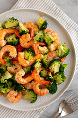 Homemade Garlic Broccoli Shrimp Stir Fry on a Plate, top view.