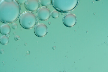 Top view oil bubbles drop on the water with colorful background, Macro photography concept