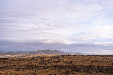 Mountain Range Overlooking Field, Fuerteventura, Spain