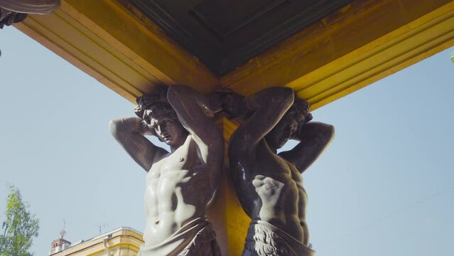 sculptures of Atlantis, mid-19th century,  entrance to the Hermitage, St. Petersburg, Russia