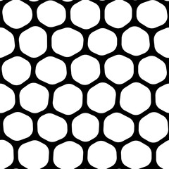A bold black and white seamless vector pattern featuring a honeycomb motif in a mesh-like design