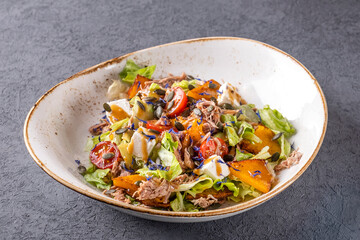 Duck meat, baked pumpkin, vegetables and cheese. Autumn salad