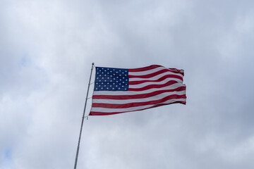 american flag against sky