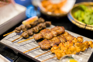 Grilled chicken skewers in restaurant