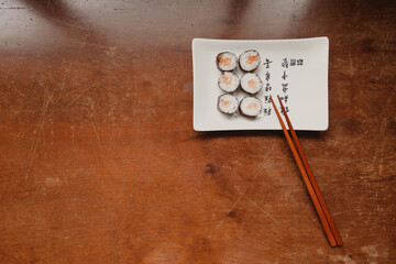 salmon maki sushi copy space © Claudia Hi