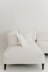 White large Sofa with pillows in white living room