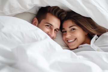 Young couple sweet moment together on bed.