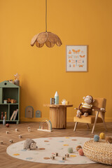 Interior design of warm kids room with mock up poster frame, green shelf, plush toys, yellow wall,...