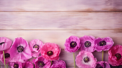  a group of pink flowers sitting on top of a wooden table.  generative ai