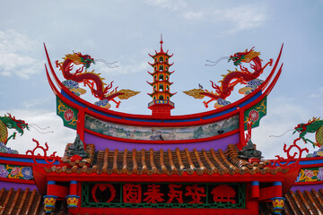 Chinese Temple Roof with Pagoda and Dragon Statues
