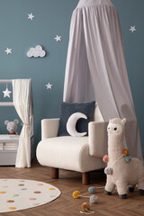 Interior design of cozy child room interior with bed, stylish rack, armchair, blue wall, round rug,...