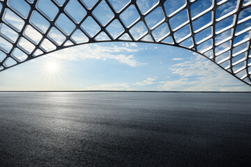 Fototapeta premium Asphalt road and building frame background