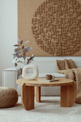 Aesthetic composition of living room interior with mock up poster,  modular beige sofa, round...