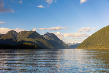 South Beach at Alouette Lake in Golden Ears Provincial Park, with shadows on the mountain peaks in the distance. Maple Ridge, British Columbia