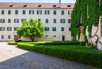 Obraz premium Novacella Augustinian Abbey in the municipality of Vahrn in the northern Italian province of South Tyrol, Brixen, Bressanone, juni 12, 2023