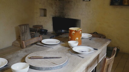 Humble Farmhouse Dining Area with Traditional Wooden Furnishings, Antique Wooden Dining Setup in Rustic Farmhouse Interior