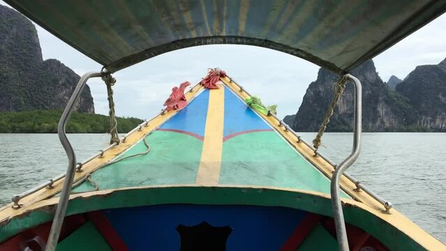 Riding on traditional long tail boat in Phang Nga province
