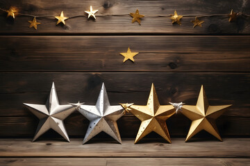 Golden and silver stars in front of a wall made of dark wooden panels