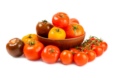 Various colorful tomatoes isolated on white background. Fresh yellow, red, black, pink and brown tomatoes. Fresh vegetables. Vegan. Close-up. Healthy food. Salad Ingredients.