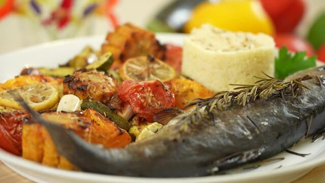 Baked trout fish with grilled vegetables