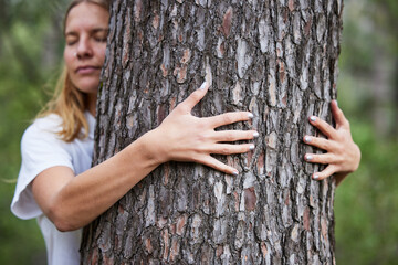 Woman, hug and tree with care for environment or conservation in outdoor for eco friendly person....
