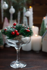 The New Year's glass for the drink is decorated with a fir wreath. The concept of Christmas and New Year