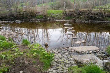Fototapeta na wymiar Stepping stones over the River Dee in Dent