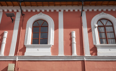 Street view of the facade of an old colonial building, Quito, Ecuador.
