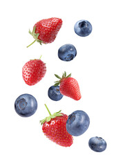 Fresh ripe blueberries and strawberries flying on white background
