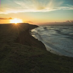 Scenic view of a beautiful sunset over a tranquil ocean landscape, Isle of wight