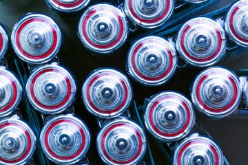 Battery,Closeup of pile of used alkaline batteries. Close up colorful rows of selection of AA...