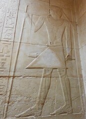 Old egypt hieroglyphs carved on the stone