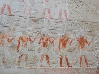 Old egypt hieroglyphs carved on the stone