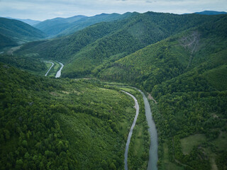 Fototapeta na wymiar Aerial photo of a beautiful river in Carpathian mountains, Western Ukraine