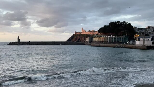 Sunset on Luarca beach, town in Asturias (Spain)