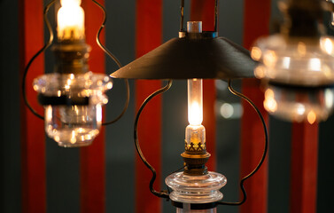 Vintage hanging lamps in dark red interior
