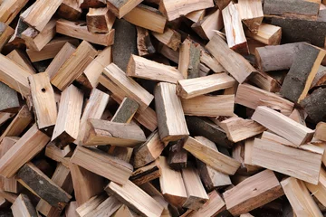 Kissenbezug stacked dry firewood as a background © maho