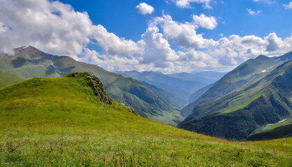 Beautiful green mountain valley. Scenic grassy mountains. Summer day in Georgia. Amazing bright mountain landscape