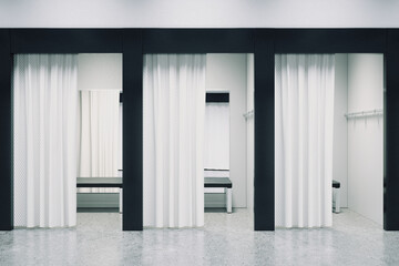 Contemporary fitting room interior in a mall. Dressing room in a clothing store