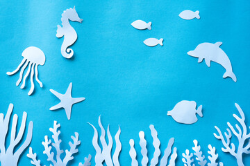 Fototapeta na wymiar Marine life paper cut background for copy space
