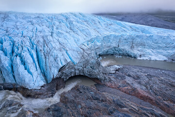 Aerial view of the Russell Glacier near Kangerlussuaq at sunset, front view the top of the glacier....
