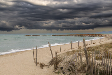 the vermilion coast under a stormy sky