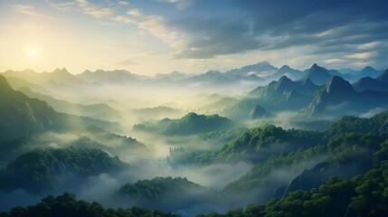 Fototapeta premium A striking landscape of mountainous terrain enveloped by mist at dawn.
