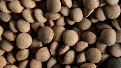 Close-up shot of an array of lentils scattered in a heap.