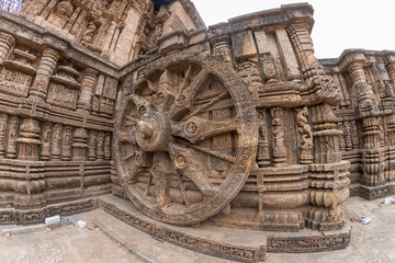 Fototapeta na wymiar Ancient Indian architecture Konark Sun Temple in Odisha, India. This historic temple was built in 13th century. This temple is an world heritage site.