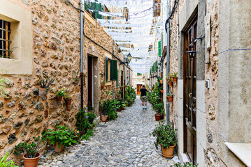 Beautiful views of a street in the picturesque and famous town of Valldemosa, Mallorca, Balearic Islands, Spain
