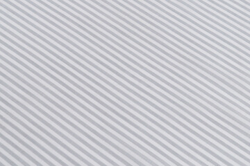 Fototapeta premium texture crumpled gray and white striped cotton fabric close-up. natural materials for sewing clothes. background for your design