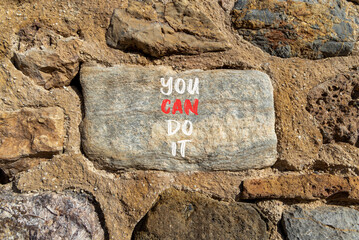You can do it symbol. Concept word You can do it on beautiful stone. Beautiful stone wall background. Business motivational you can do it concept. Copy space.