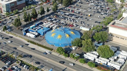 a parking lot with a large blue tank on top of it